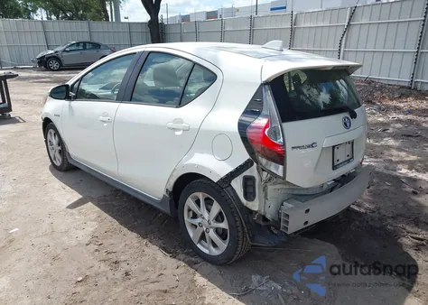 2018 Toyota Prius C Four from USA, damaged, VIN JTDKDTB35J1602314